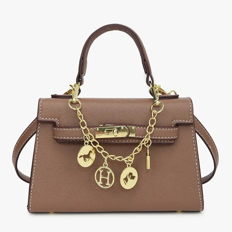 2025 sac fourre-tout à serrure tournante femmes sac à bandoulière minimaliste Style Kelly jour à nuit trajet voyage sac à bandoulière Euro Chic