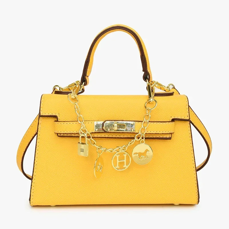 2025 sac fourre-tout à serrure tournante femmes sac à bandoulière minimaliste Style Kelly jour à nuit trajet voyage sac à bandoulière Euro Chic