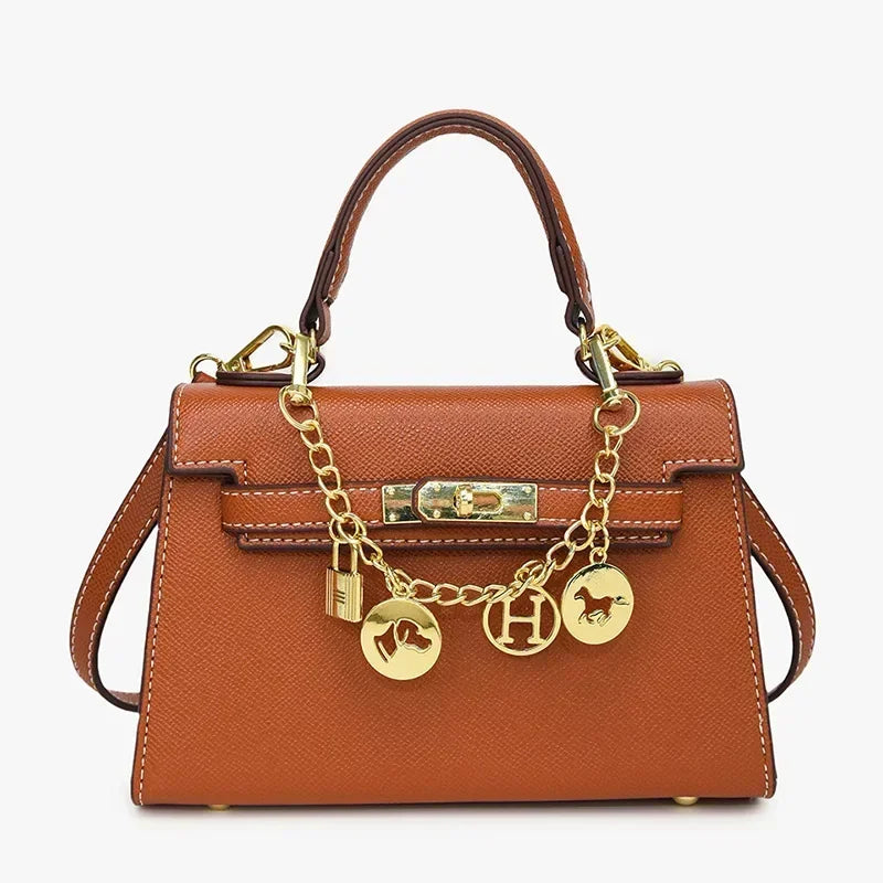 2025 sac fourre-tout à serrure tournante femmes sac à bandoulière minimaliste Style Kelly jour à nuit trajet voyage sac à bandoulière Euro Chic