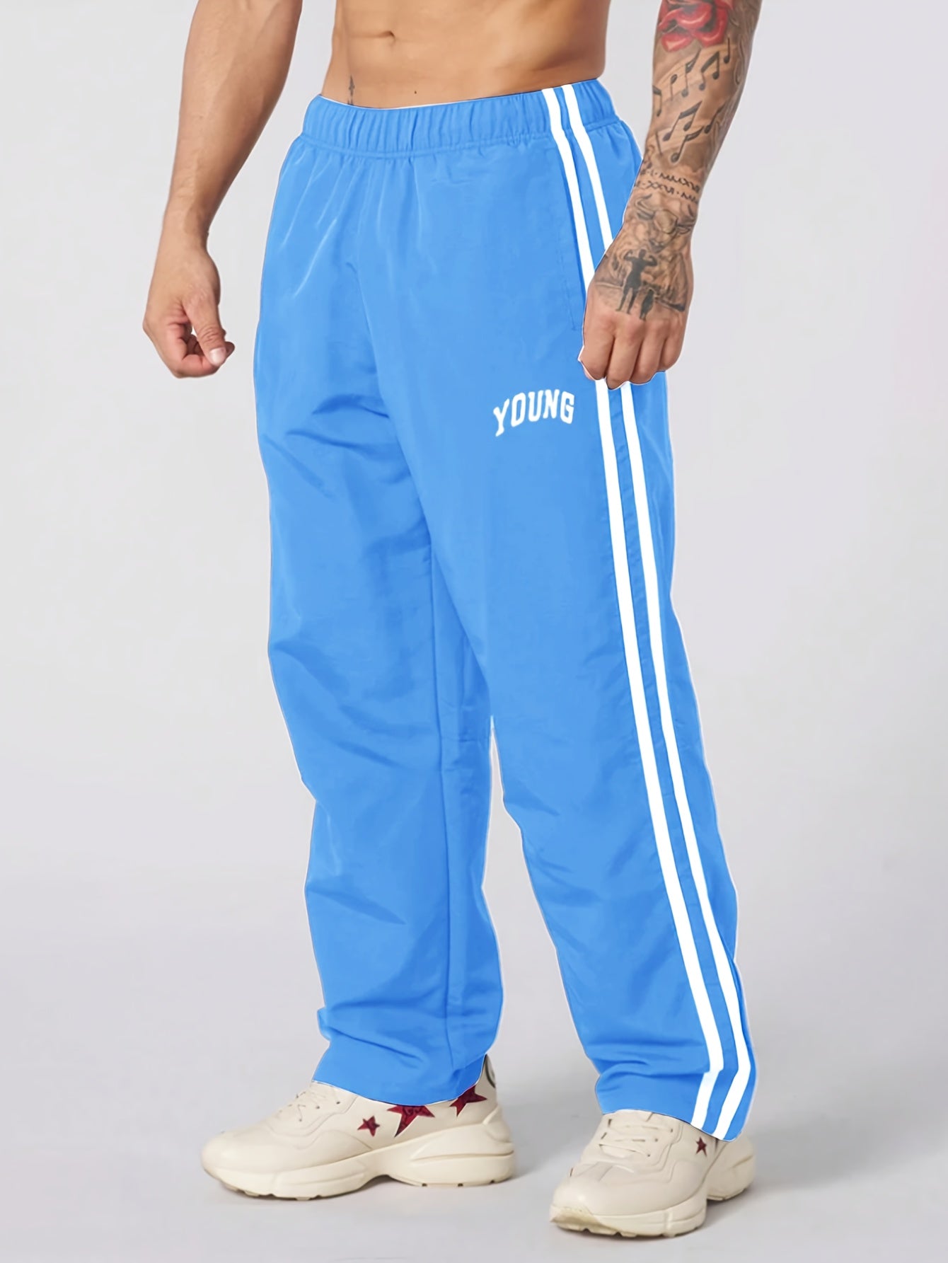 Joggers athlétiques légers pour hommes - Vert vibrant à rayures blanches, imprimé "JEUNE", coupe ample, taille à cordon de serrage, parfait pour la salle de sport, les vêtements décontractés ou le cadeau pour la famille et les amis, pantalon