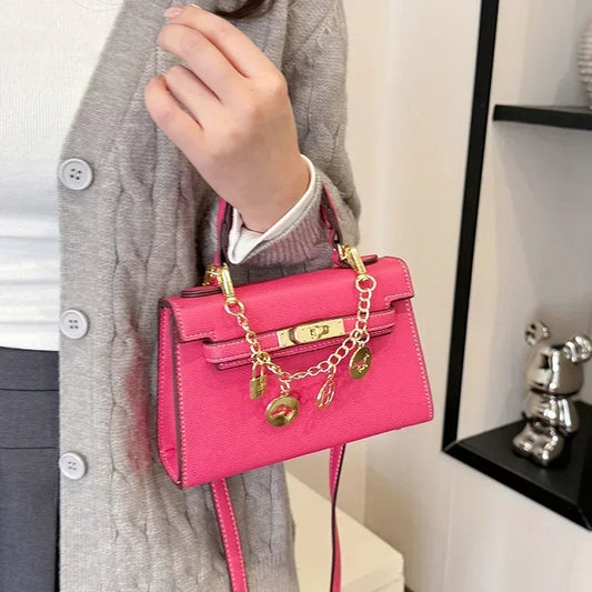 2025 sac fourre-tout à serrure tournante femmes sac à bandoulière minimaliste Style Kelly jour à nuit trajet voyage sac à bandoulière Euro Chic